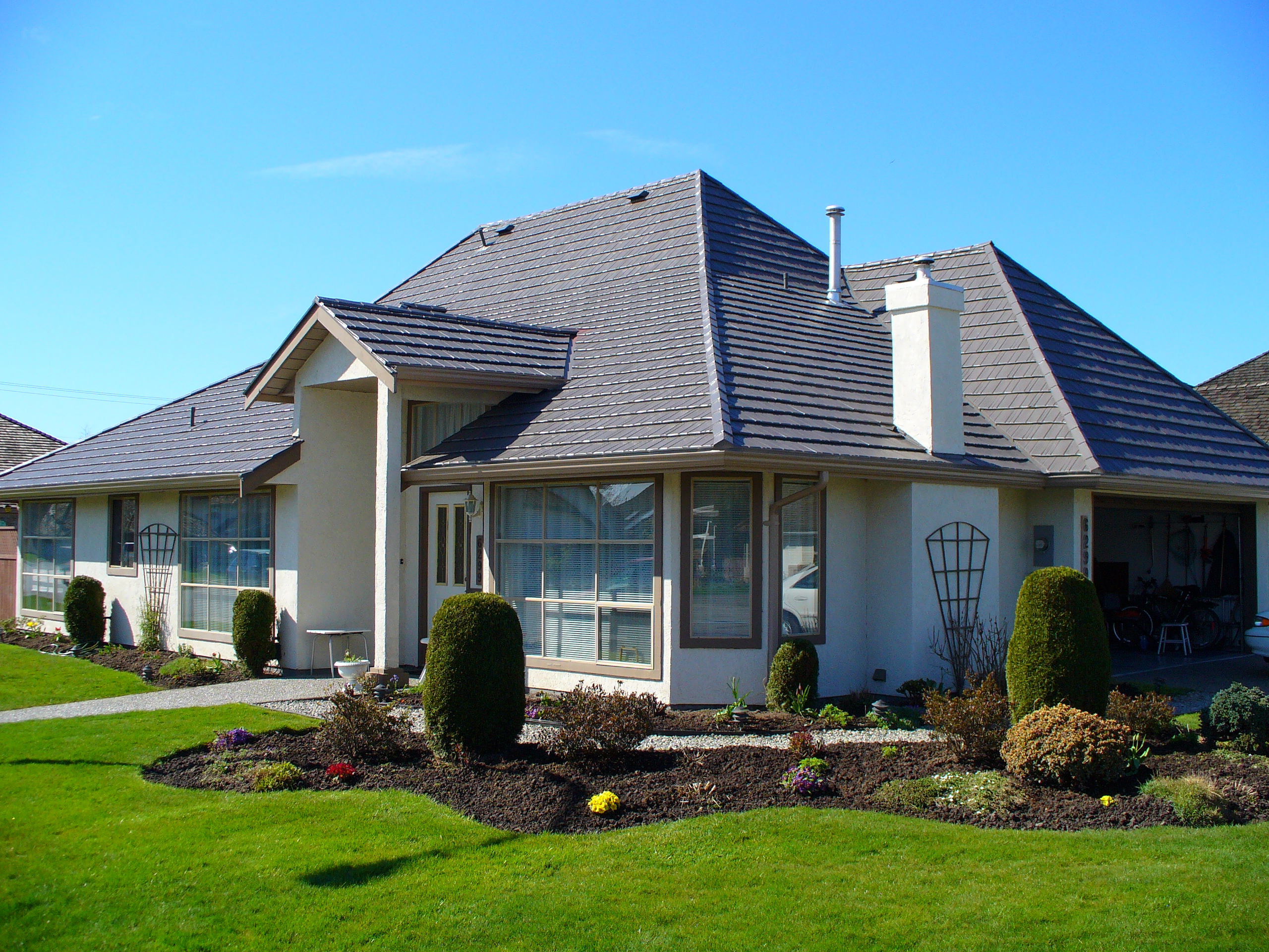 Home featuring RARE Ironwood roofing and integrated solar technology